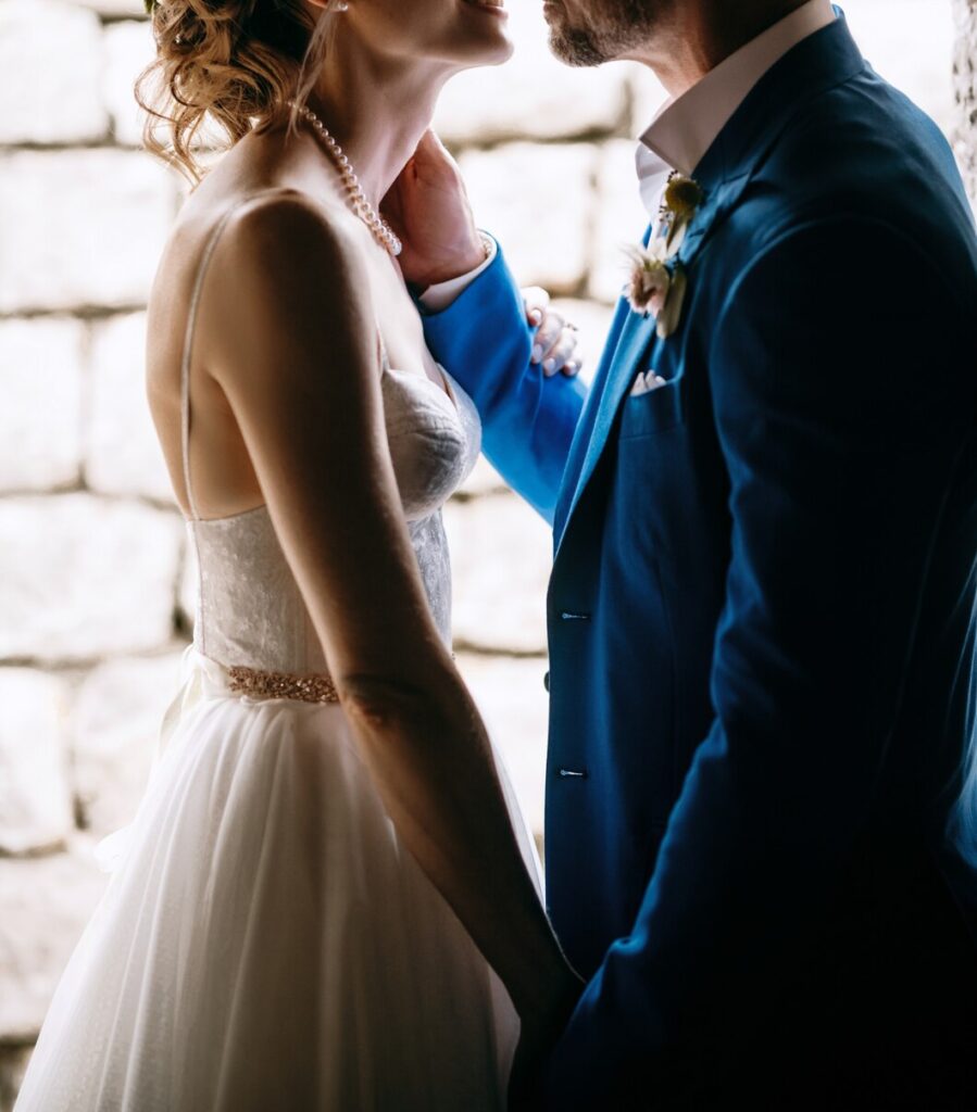 wedding couple standing outside